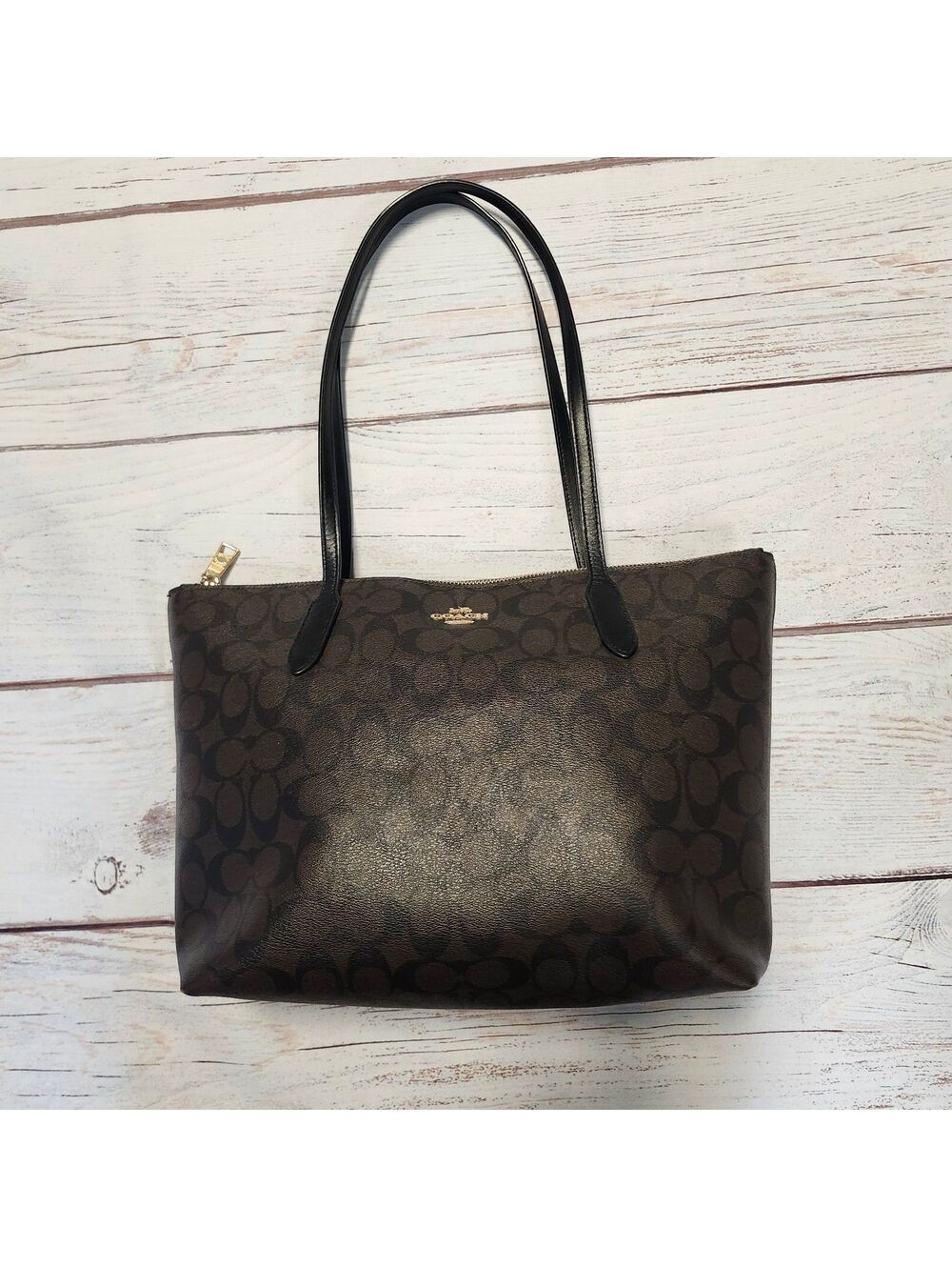 Coach Zip Top Signature brown tote bag